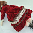 Laden Sie das Bild in den Galerie-Viewer, Puppe mit Rotem Kleid / Porzellankopf & Stoffkörper / ca. 47 cm