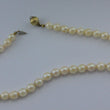 Laden Sie das Bild in den Galerie-Viewer, Vintage Perlenkette - mit 925er Silber Verschluss vergoldet / ca. 42 cm 6,6 mm