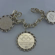 Laden Sie das Bild in den Galerie-Viewer, Vintage Münz-Charivari - Trachtenarmkette mit Münzen / 835er Silber