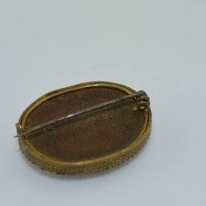 antike Brosche - mit „gemaltem Blumenmotiv“
