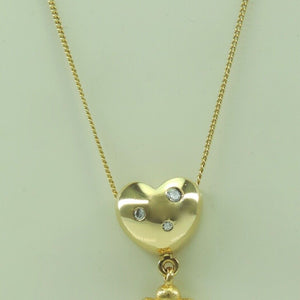 Damen Kette mit Anhänger / 750er 18 Karat Gold / ca. 0.10ct. Diamanten / 48 cm