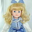 Laden Sie das Bild in den Galerie-Viewer, Puppe mit blau weißem Kleid / Porzellankopf &amp; Stoffkörper / ca. 33 cm
