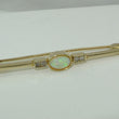 Laden Sie das Bild in den Galerie-Viewer, Vintage Anstecknadel mit Opal &amp; Zirkonia / 333er - 8 Karat Gelbgold
