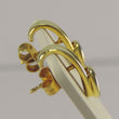 Laden Sie das Bild in den Galerie-Viewer, Vintage Ohrstecker mit Zirkonia 0.25 ct 750er 18 Karat Gelbgold
