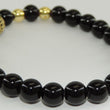 Laden Sie das Bild in den Galerie-Viewer, Unisex elastisches Armband vergoldet mit Perlenoptik 17-21 cm
